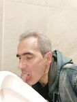 The loser faggot Oleg Yakubovsky licking urinals.