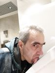 The loser faggot Oleg Yakubovsky licking urinals.
