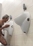 This queer Oleg Yakuba loser licking urinals .