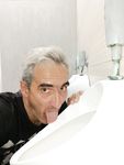 The loser realtor Oleg Yakuba urinals licking.