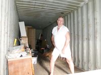 Sharon the sissy whore tries on some of her dresses