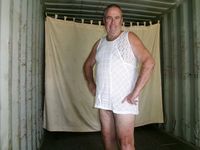 Sharon the sissy whore tries on some of her dresses