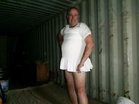 Sharon the sissy whore tries on some of her dresses