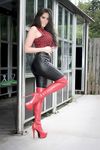 Pornstar Queen Eugenia in incredible red high boots