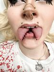 body modificaions/ split toung/piercing