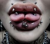 body modificaions/ split toung/piercing