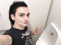 Femboy licks urinal at sports arena