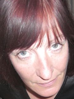 LederladyT LLT Ledersuit face