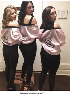 WHITE SLAVE GIRLS IN OBSCENE OUTFITS