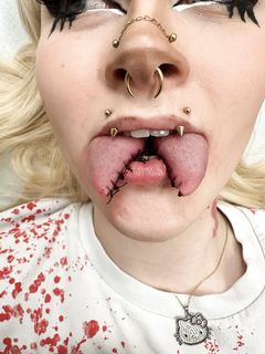 body modificaions/ split toung/piercing