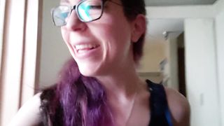 Nerdy babe pissing on a public carpet in a hotel