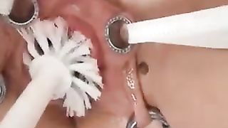 Extremely stretched pierced labia And Toilet brush in pussy insertion