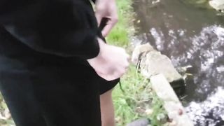 Pissing Outdoors with a Big Cock Twink