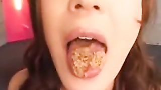 Watch this Japanese hottie swallow cum like a champ in this group action frenzy!