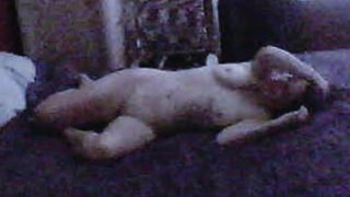 Mature naked on the bed