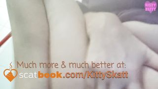 Kitty Skatt naughty on toilet
