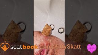 Kitty Skatt soft shit on toilet