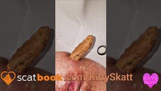 Kitty Skatt soft shit on toilet
