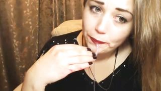 Hand into her mouth