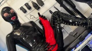 Solo 1 Showcasing Studio Black Latex Catsuit and Huge Red Cobra