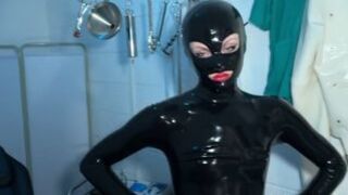 Solo 1 Showcasing Studio Black Latex Catsuit and Huge Red Cobra