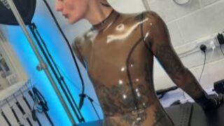 Solo 2 Showcasing Translucent Latex Outfit and Hankeys Toys Stra