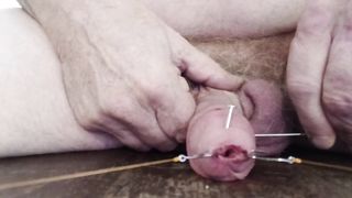 skewer thru nailed and hooked cock